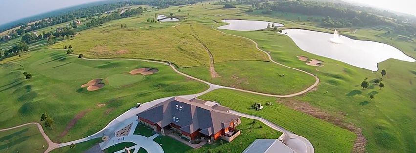 Panoramic view of a lush green golf course at Peoria Ridge Golf Course. Smooth