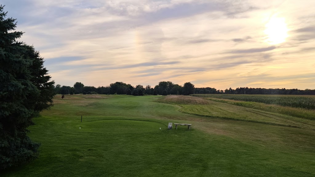 Panoramic view of a lush green golf course at Pigeon Creek Golf Course. Smooth