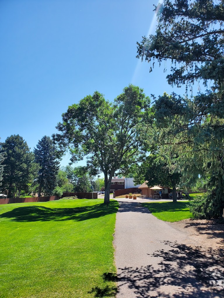 Panoramic view of a lush green golf course at Pinehurst Country Club. Smooth