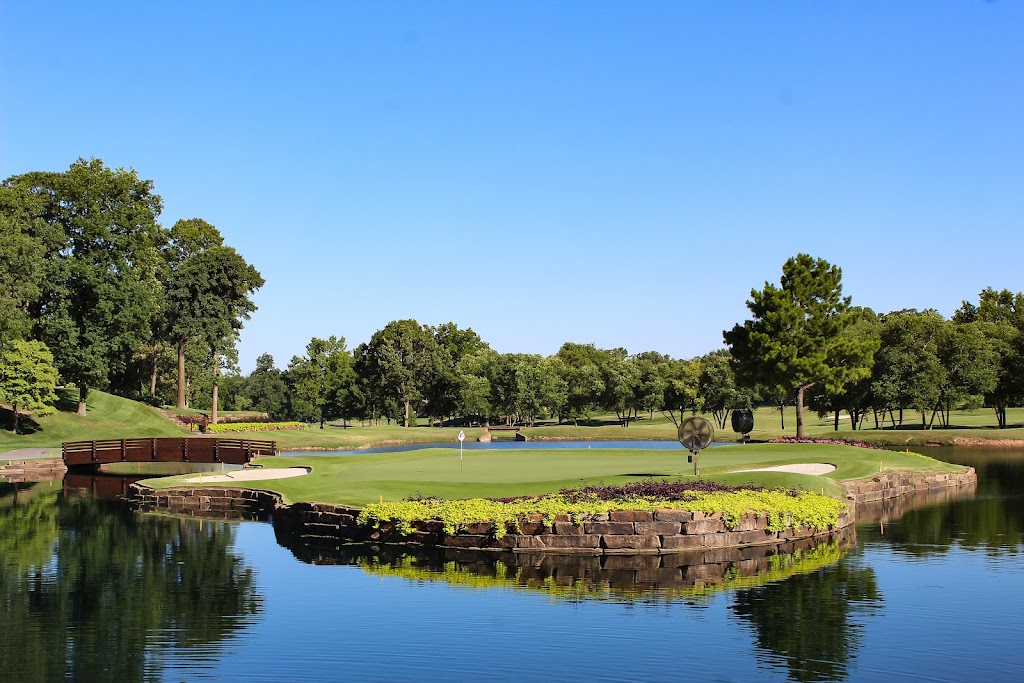 Panoramic view of a lush green golf course at Pinnacle Country Club. Smooth