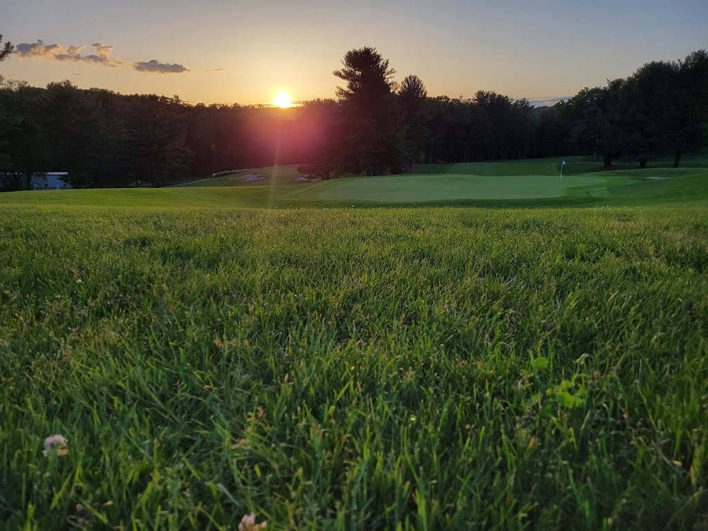 Panoramic view of a lush green golf course at Pleasant Valley Country Club. Smooth