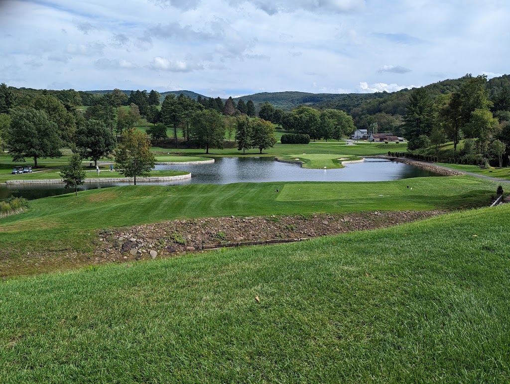 Panoramic view of a lush green golf course at Pleasant Valley Golf Club. Smooth