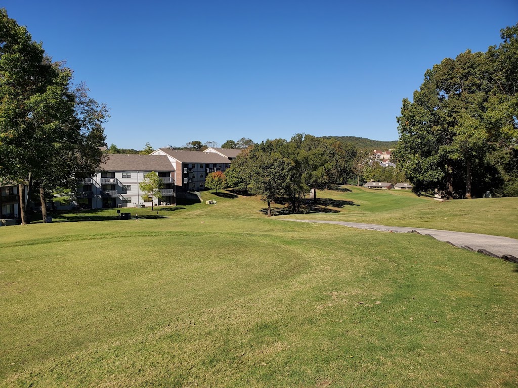 Panoramic view of a lush green golf course at Pointe Royale Golf Course. Smooth