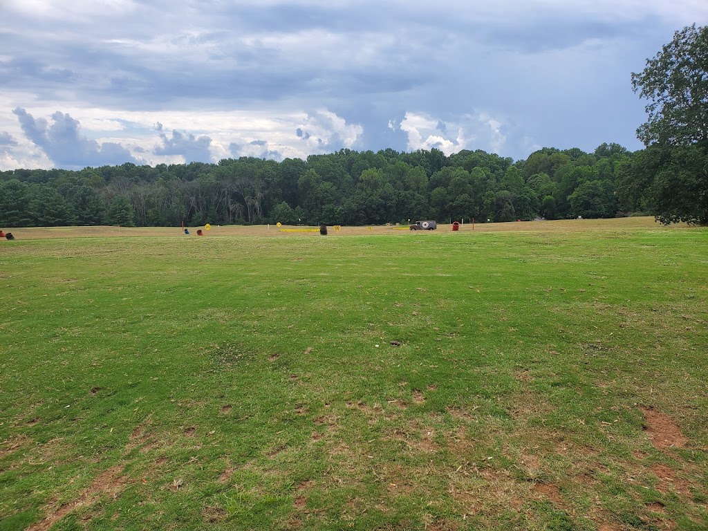 Panoramic view of a lush green golf course at Poplar Forest Golf Course. Smooth