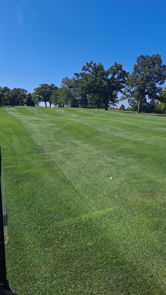 Panoramic view of a lush green golf course at Portage Golf Club. Smooth