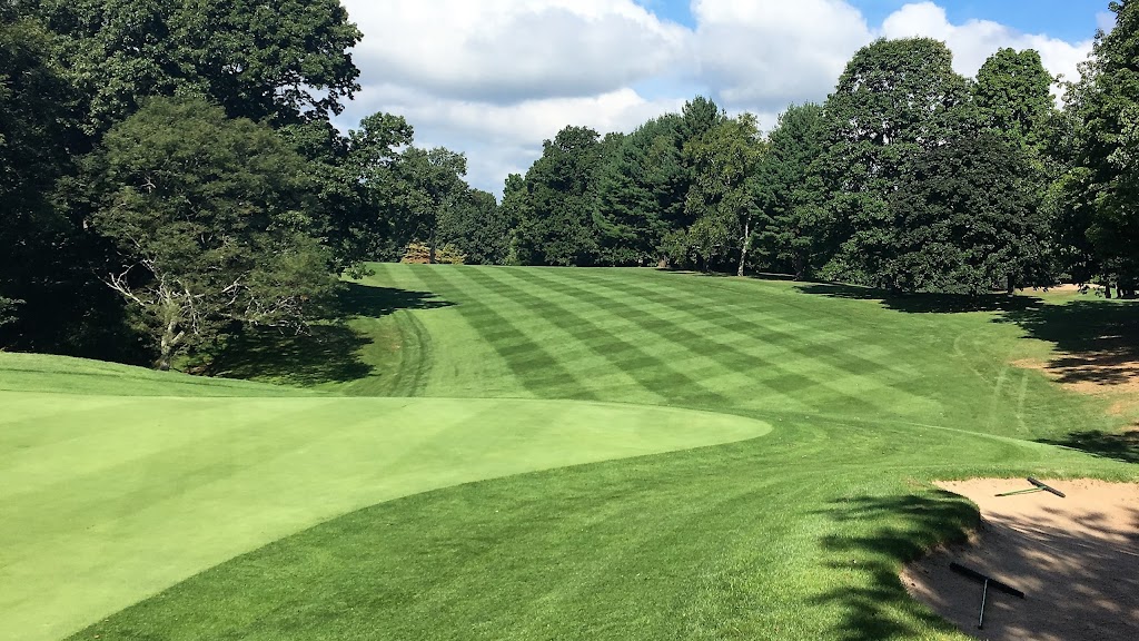 Panoramic view of a lush green golf course at Portland Golf Course. Smooth