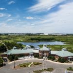 Panoramic view of a lush green golf course at Prairie Landing Golf Club. Smooth