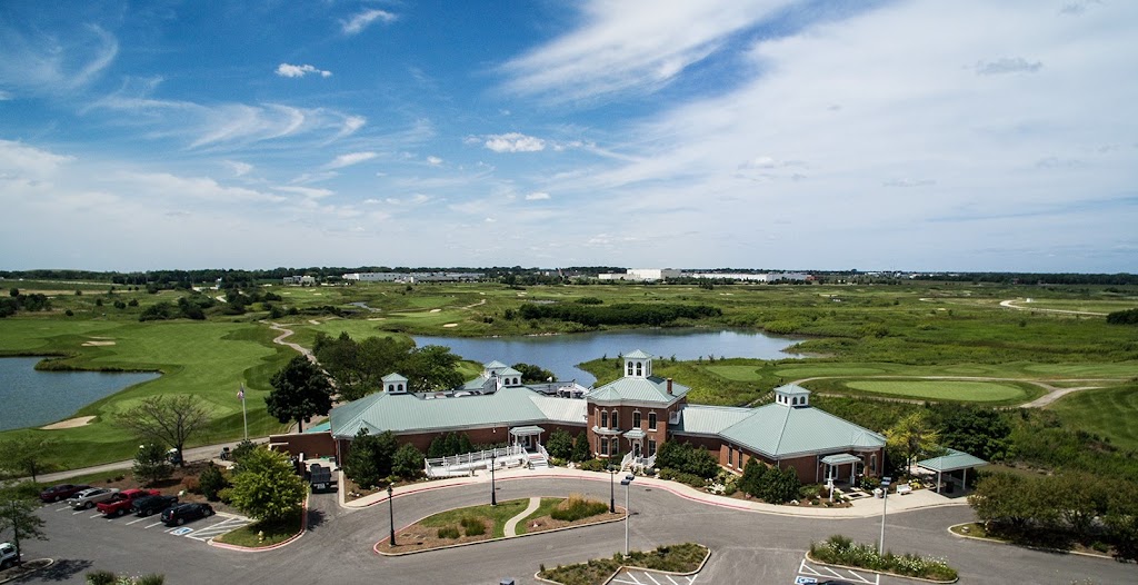 Panoramic view of a lush green golf course at Prairie Landing Golf Club. Smooth