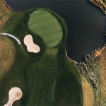 Panoramic view of a lush green golf course at Prairie Links Golf Course & Event Center. Smooth