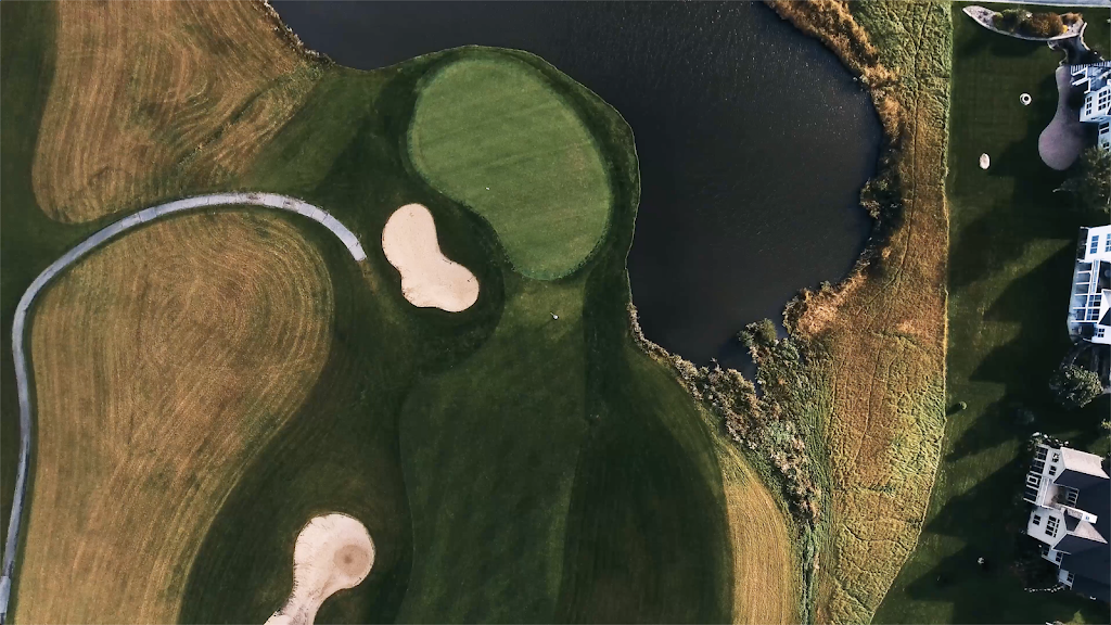 Panoramic view of a lush green golf course at Prairie Links Golf Course & Event Center. Smooth