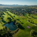 Panoramic view of a lush green golf course at Prescott Golf Club. Smooth