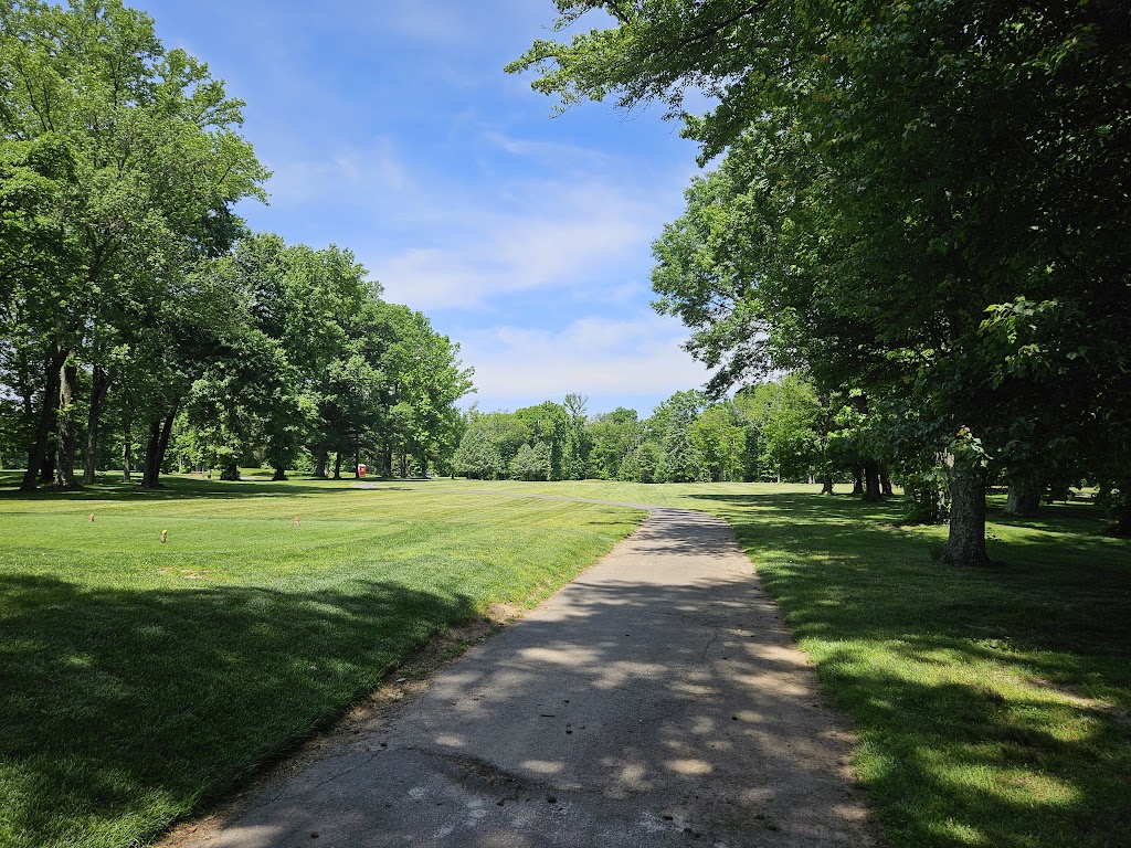 Panoramic view of a lush green golf course at Princeton Country Club. Smooth