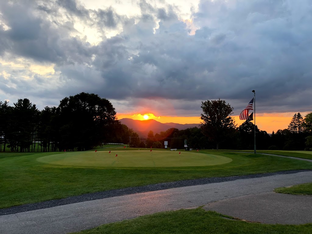 Panoramic view of a lush green golf course at Proctor-Pittsford Country Club. Smooth