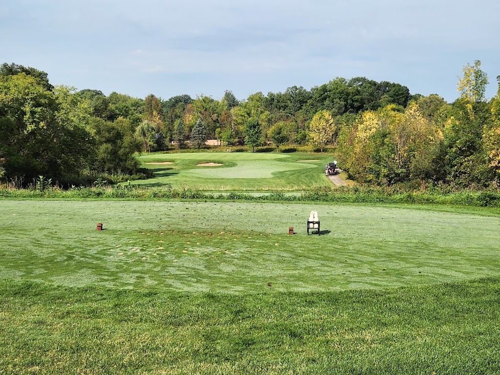 Panoramic view of a lush green golf course at Quail Ridge Golf Club. Smooth