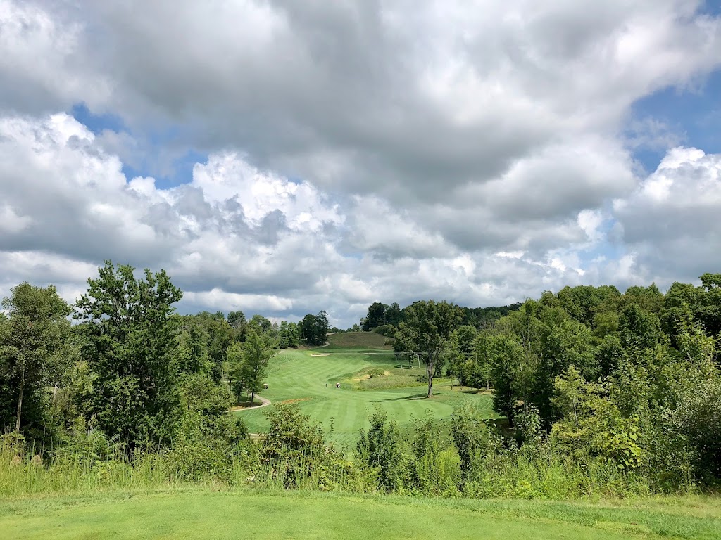 Panoramic view of a lush green golf course at Quarry Golf Course Maintenance Facility. Smooth