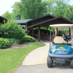 Panoramic view of a lush green golf course at Raintree Golf & Event Center. Smooth