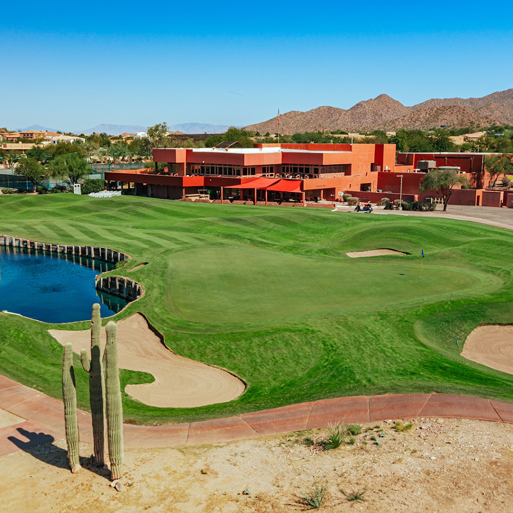 Panoramic view of a lush green golf course at Red Mountain Ranch Country Club. Smooth