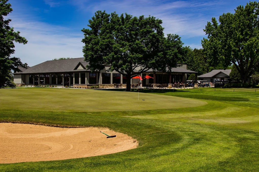 Panoramic view of a lush green golf course at Reedsburg Country Club. Smooth