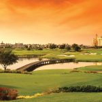 Panoramic view of a lush green golf course at Reunion Resort Golf Courses - Palmer & Watson. Smooth