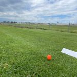 Panoramic view of a lush green golf course at Rexburg Municipal Golf Course. Smooth