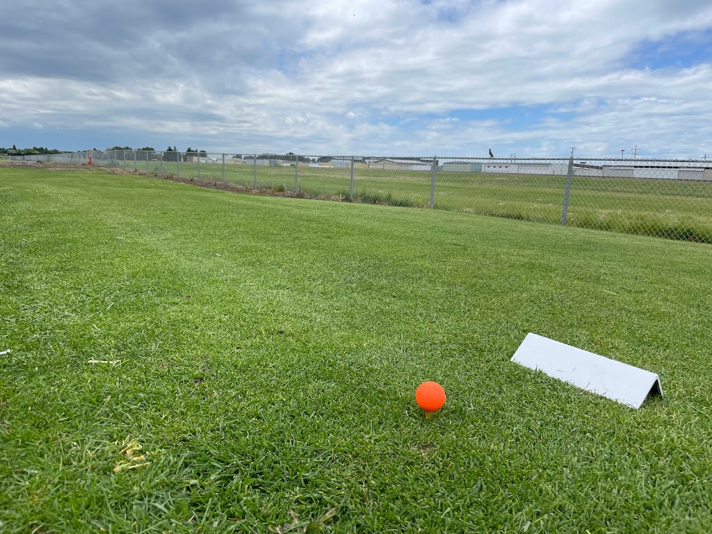 Panoramic view of a lush green golf course at Rexburg Municipal Golf Course. Smooth