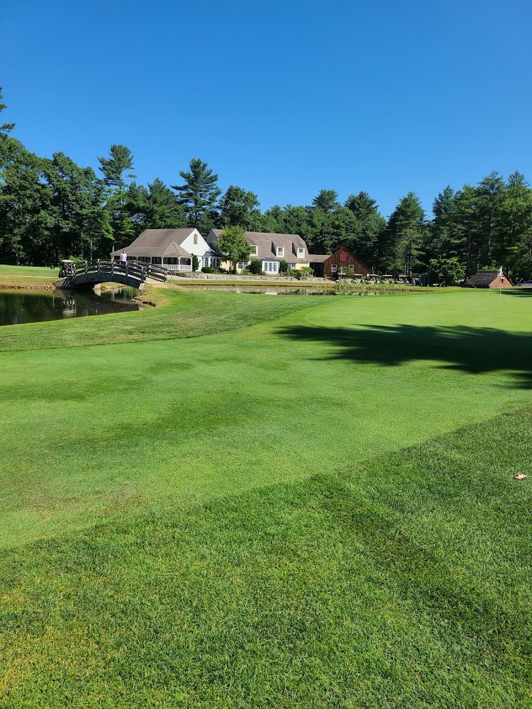 Panoramic view of a lush green golf course at Richmond Country Club. Smooth