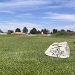 Panoramic view of a lush green golf course at Ridgecrest Golf Club. Smooth