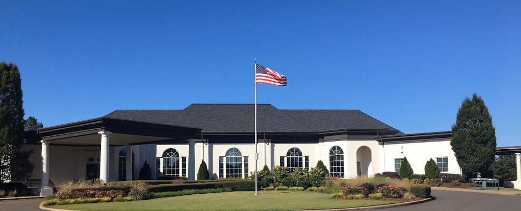 Panoramic view of a lush green golf course at Ridgeway Country Club. Smooth