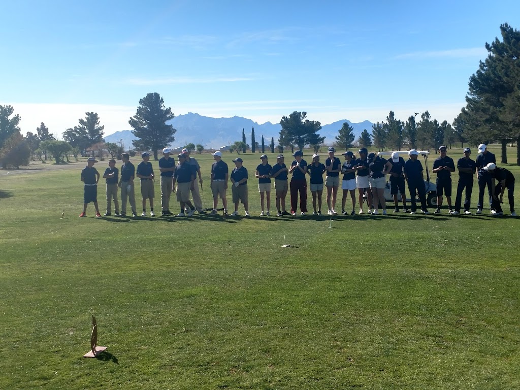 Panoramic view of a lush green golf course at Rio Mimbres Country Club. Smooth