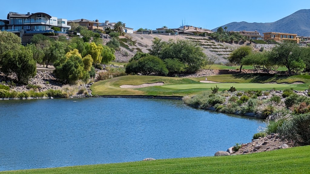 Panoramic view of a lush green golf course at Rio Secco Golf Club. Smooth