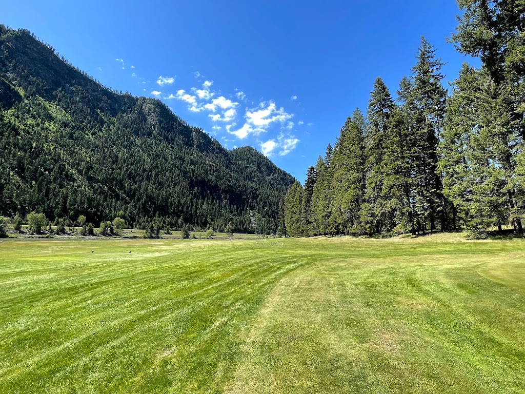 Panoramic view of a lush green golf course at Rivers Bend Golf Course. Smooth