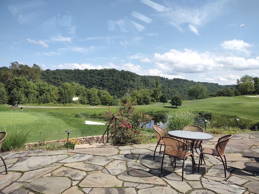 Panoramic view of a lush green golf course at Riverview Country Club. Smooth