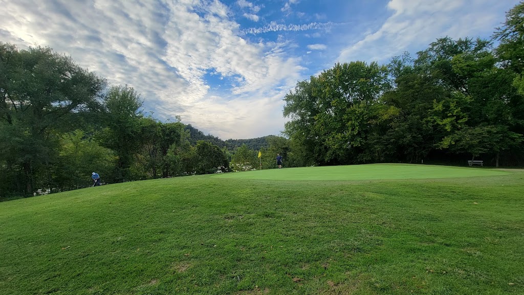 Panoramic view of a lush green golf course at Riviera Country Club. Smooth