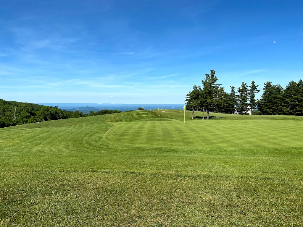 Panoramic view of a lush green golf course at Roaring Gap Club. Smooth