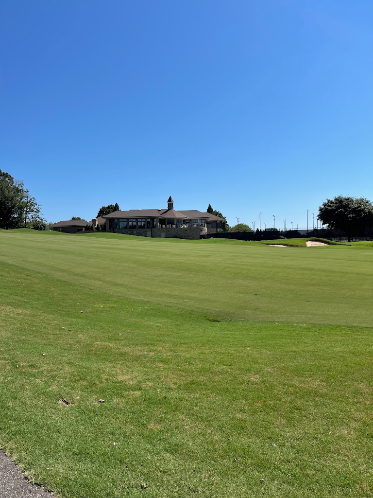 Panoramic view of a lush green golf course at Rock Barn Country Club and Spa. Smooth