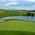 green grass with the flag in the hole.