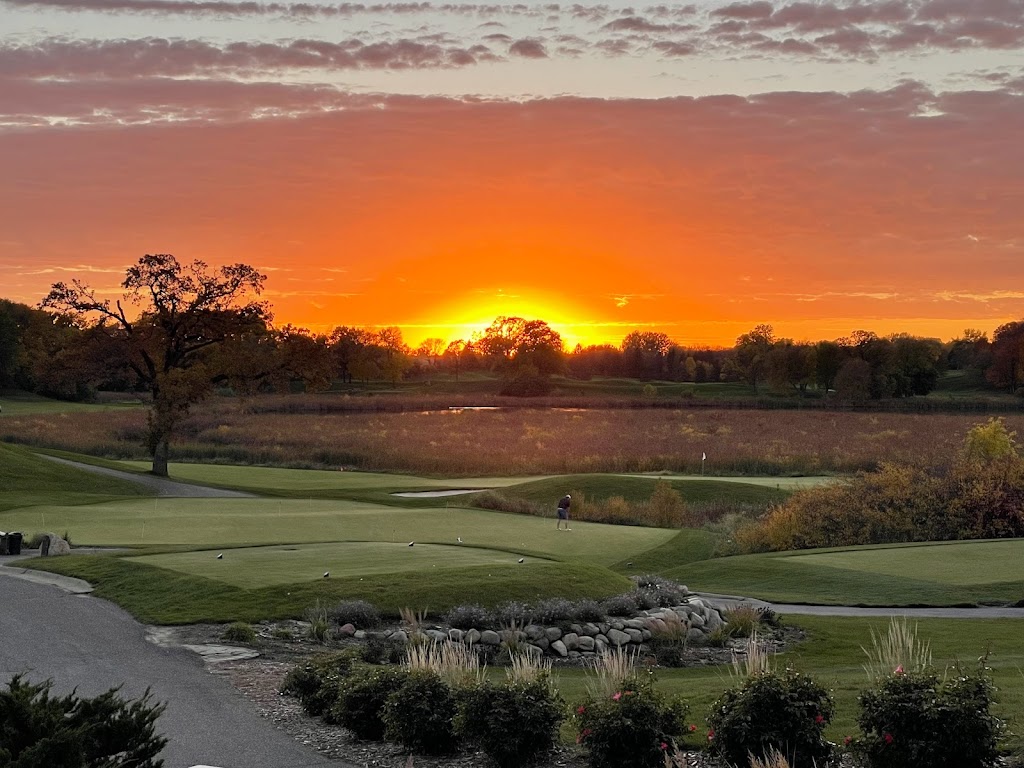 Panoramic view of a lush green golf course at Rush Creek Golf Club. Smooth