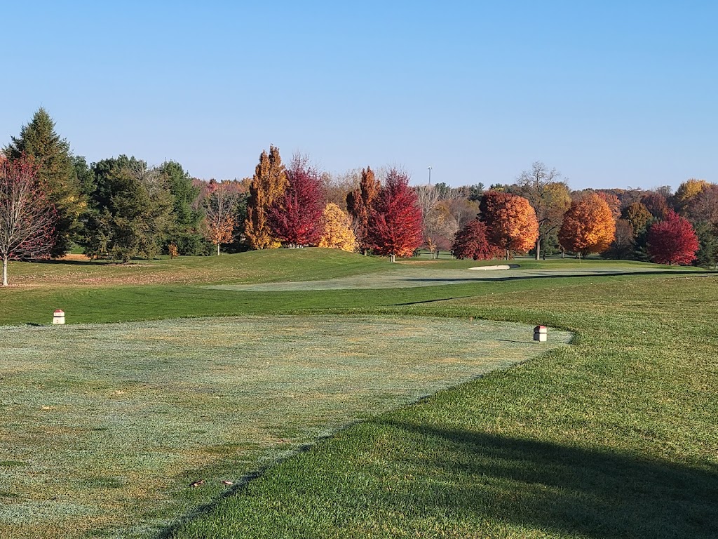 Panoramic view of a lush green golf course at Sable Creek Golf Course. Smooth