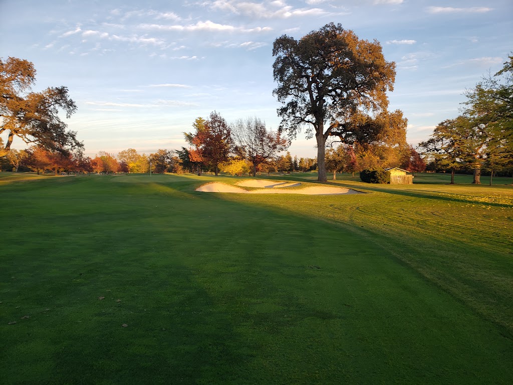 Panoramic view of a lush green golf course at Santa Rosa Golf & Country Club - CA. Smooth