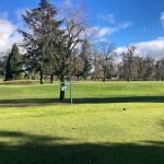 Panoramic view of a lush green golf course at Santiam Golf Club Inc. Smooth