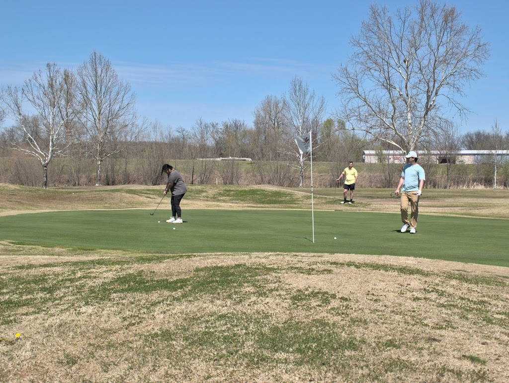 Panoramic view of a lush green golf course at Sapulpa City Golf Course. Smooth