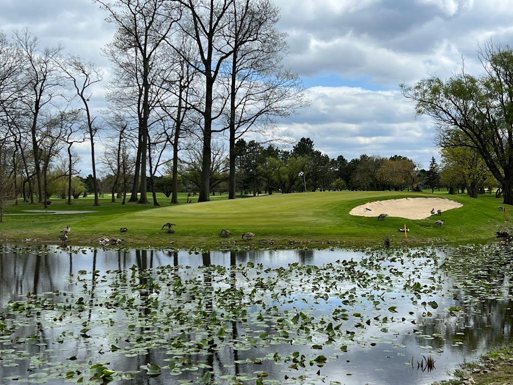 Panoramic view of a lush green golf course at Sawmill Creek Golf Club - Huron