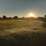 Panoramic view of a lush green golf course at Scepter Golf Club. Smooth