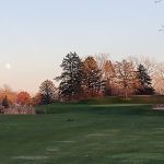 Panoramic view of a lush green golf course at Scherwood Golf. Smooth