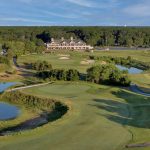 Panoramic view of a lush green golf course at Scotland Run Golf Club. Smooth