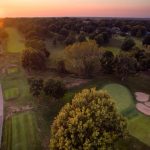 Panoramic view of a lush green golf course at Sedalia Country Club. Smooth