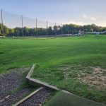 green grass with the flag in the hole.