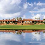 Panoramic view of a lush green golf course at Seville Golf & Country Club. Smooth