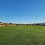 Panoramic view of a lush green golf course at Seville Golf & Country Club. Smooth