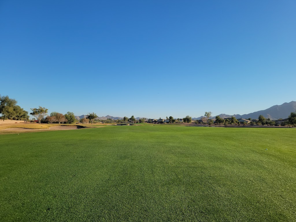 Panoramic view of a lush green golf course at Seville Golf & Country Club. Smooth